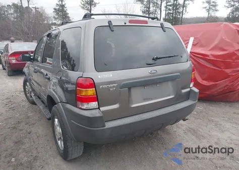 2002 Ford Escape Xlt z USA, uszkodzony, nr VIN 1FMYU03182KD40768